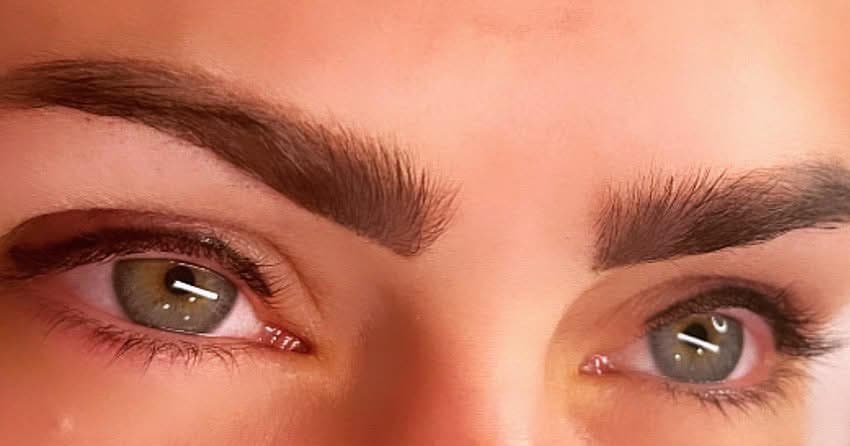 Close-up of both eyes showing defined eyeliner along the lash lines